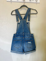 Distressed Denim Overall Shorts.