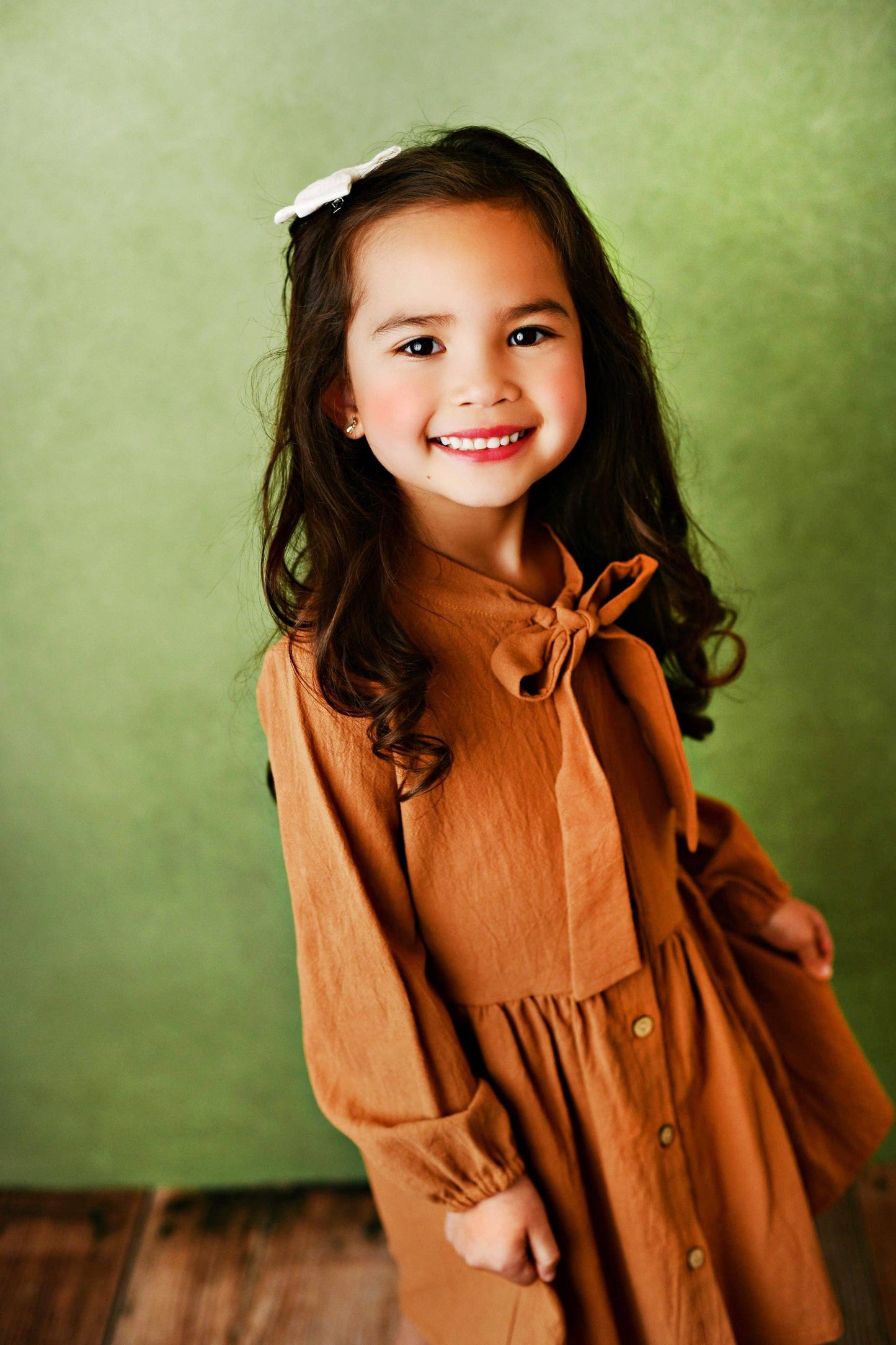 Kids Sienna Colored Button Long Sleeve Bow Dress.