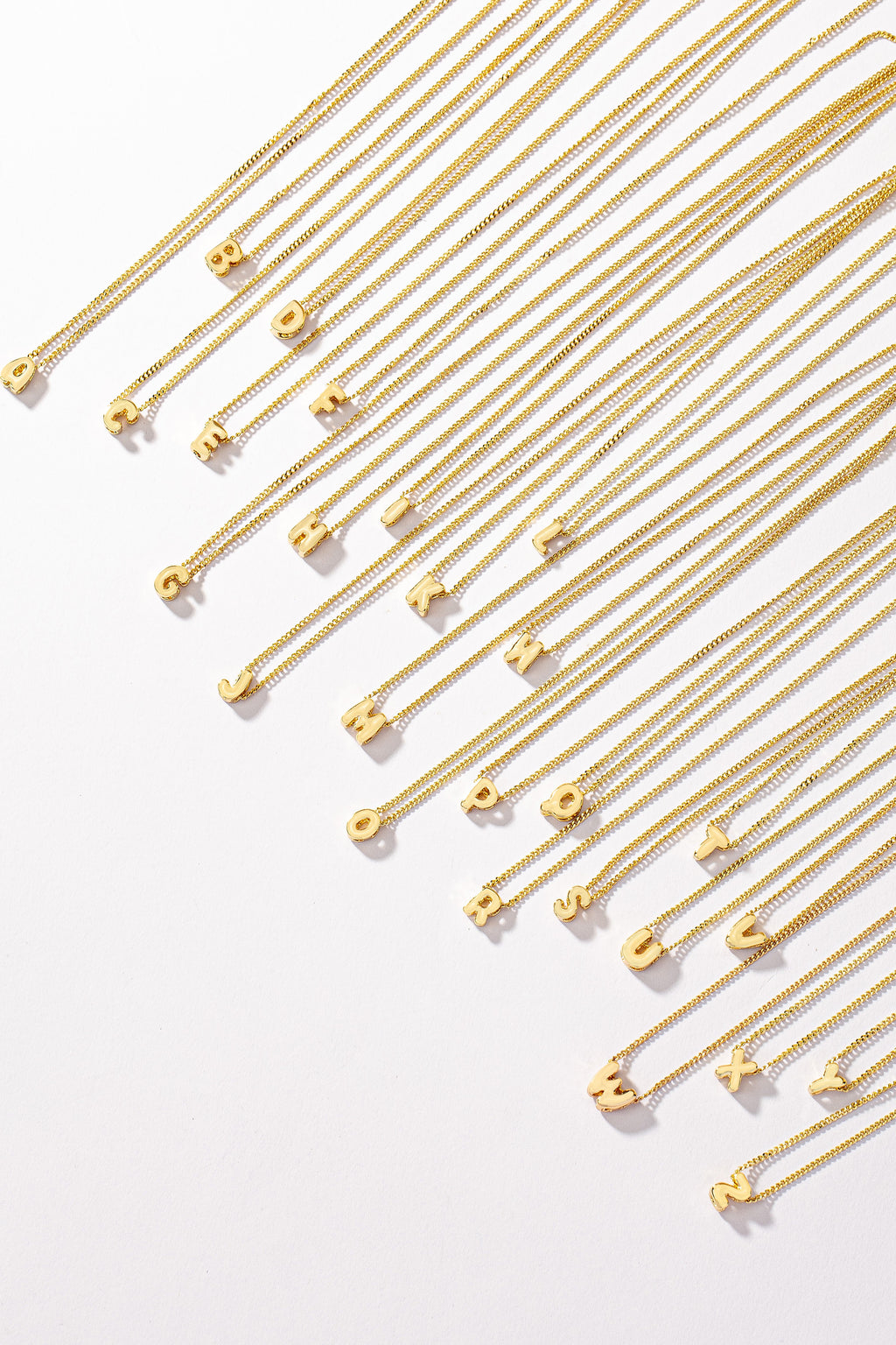 Stainless bubble/balloon letter initial necklace.