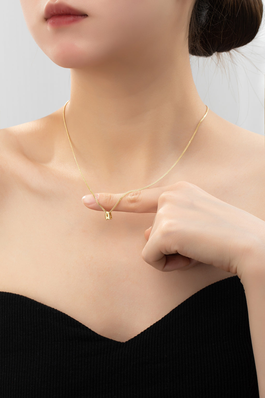 Stainless bubble/balloon letter initial necklace.