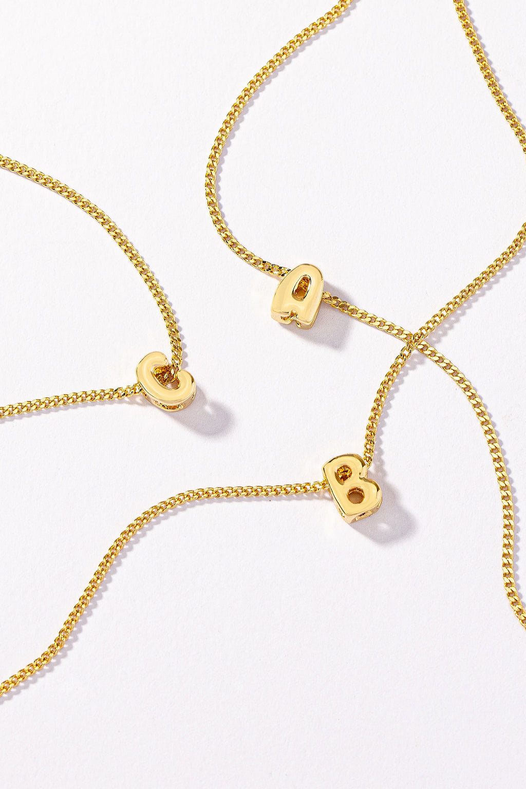 Stainless bubble/balloon letter initial necklace.