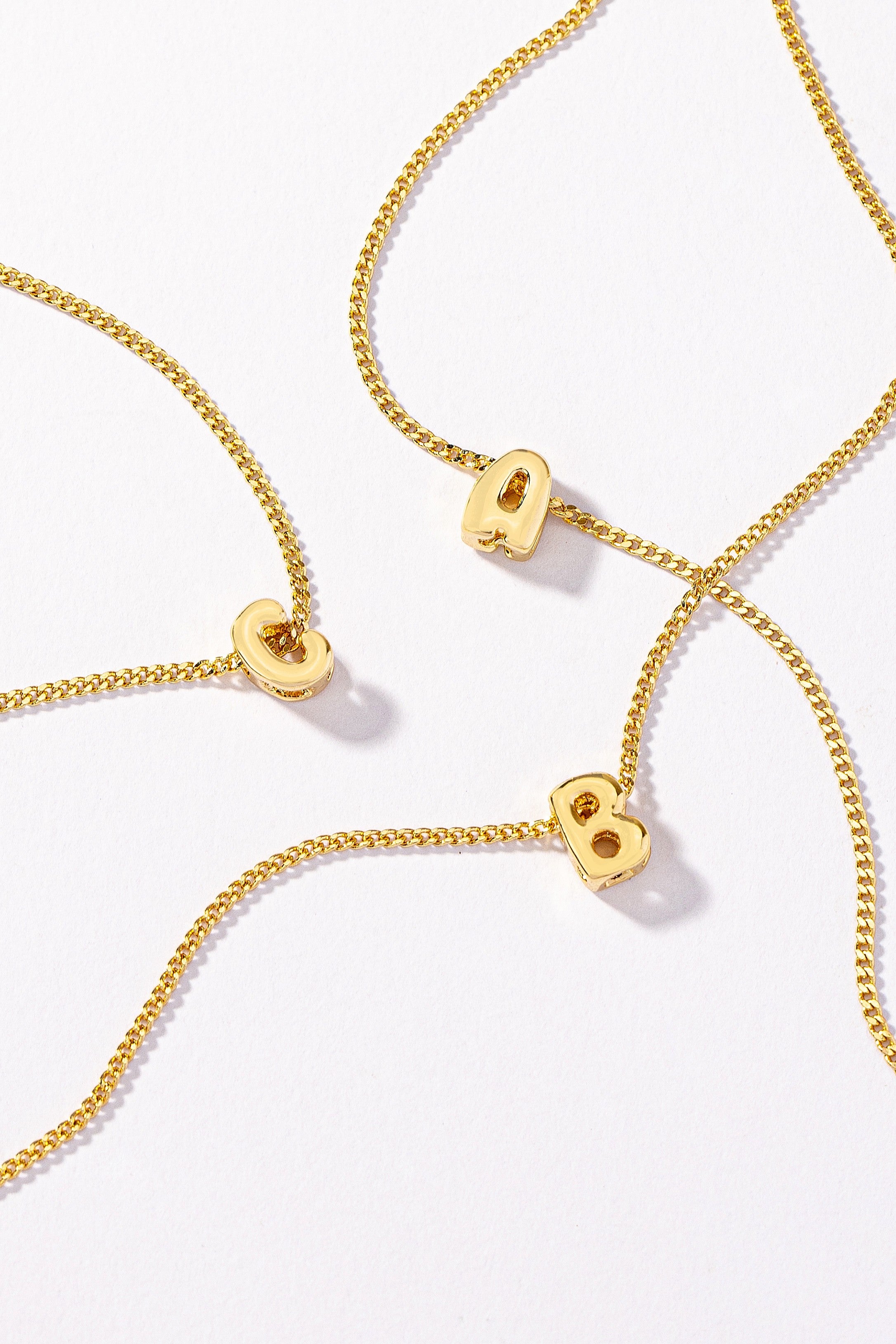 Stainless bubble/balloon letter initial necklace.