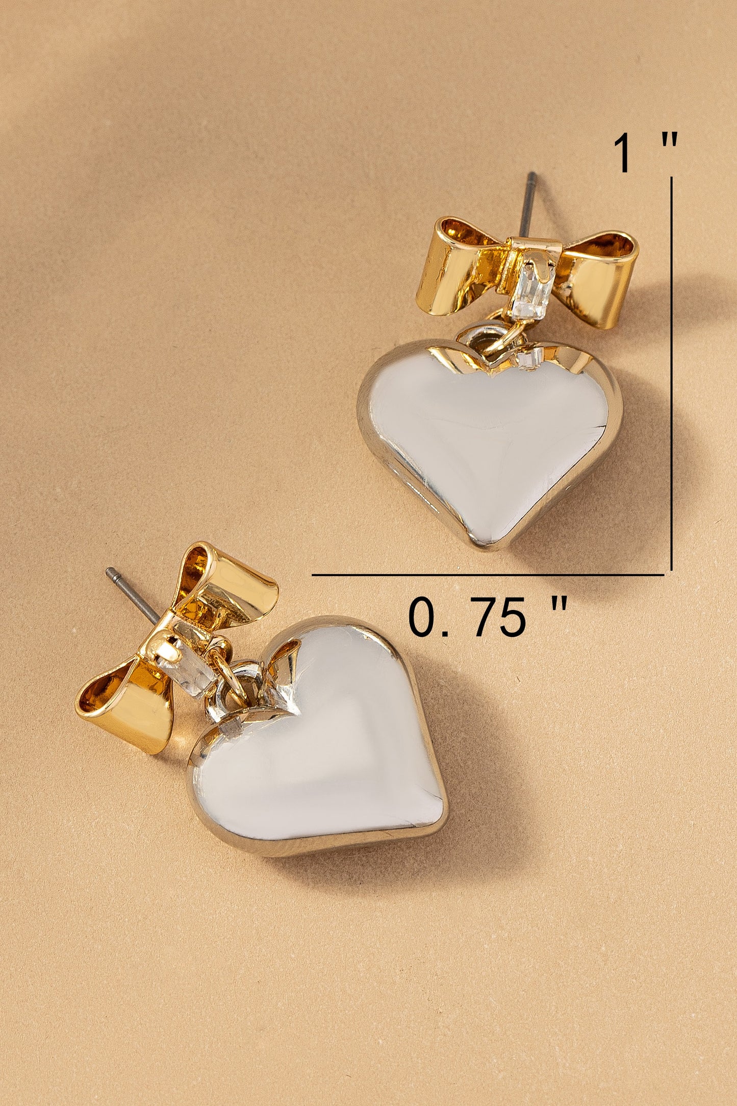 Two tone puffy heart and bow drop earrings