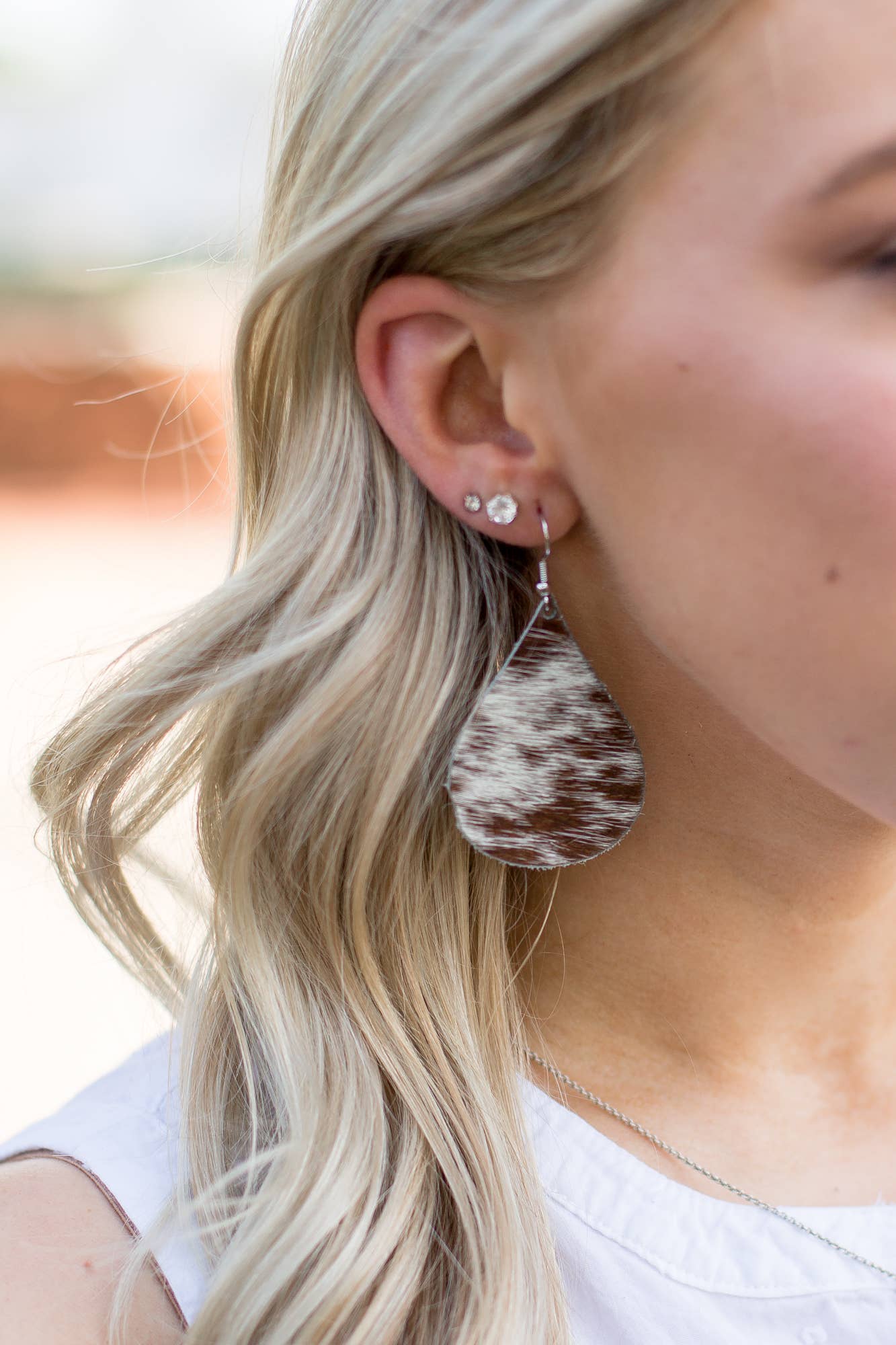 Hershey Teardrop Earrings In Hair on Hide