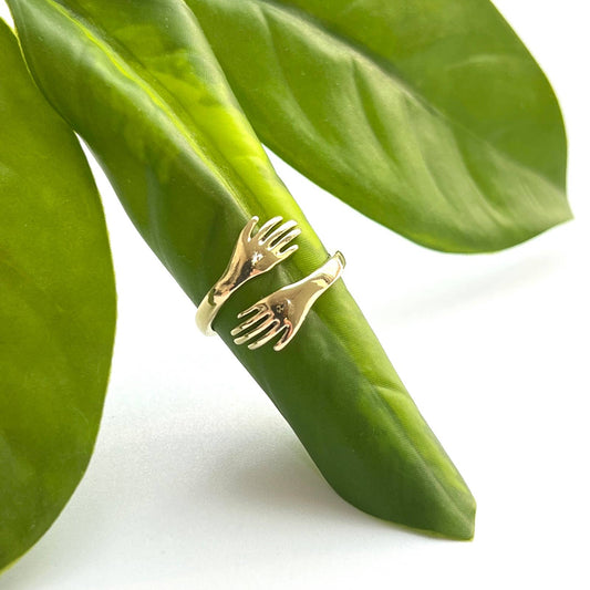 Brass Hugging Hands Ring