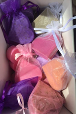 Heart shaped soaps wrapped with organza bags